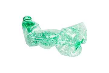 Crumpled green plastic bottle isolated, ready for recycling. Environmental concept, plastic waste.