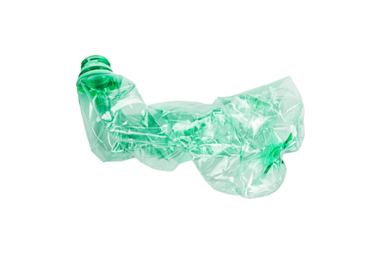 Crumpled green plastic bottle isolated, ready for recycling. Environmental concept, plastic waste.