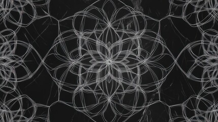 Intricate white mandala pattern on dark background