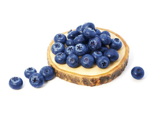 Blueberries in wooden tray isolated on white background