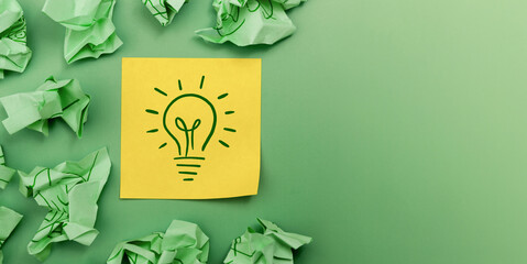 Idea, Innovation and Creativity Concept. a Light Bulb Handdrawn on Sticky Note, Brainstorm for New Business or New Product