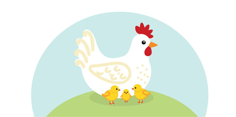 hen and three yellow chicks on a grassy hill