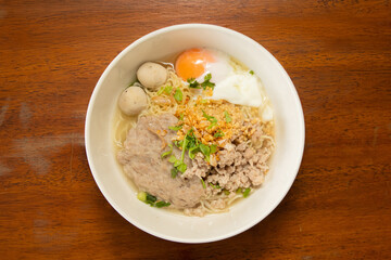 Delicious noodle soup with egg and meatballs a cozy culinary experience