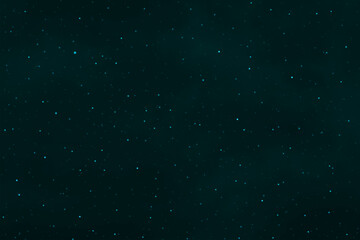 Stars in the night. Dark blue green galaxy space. Glowing stars in space. New Year, Christmas and Celebration background concept.