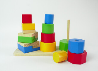 Wooden toy for baby, children isolated, stack of wooden blocks isolated on white background