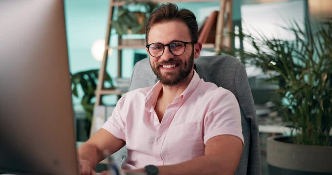 Computer, programming and web development with face of man coding software in office for testing. Design, reading and typing with happy developer employee at desk in workplace for infrastructure code