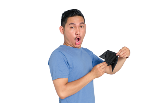 Surprised young Asian man showing empty black wallet with shocked expression, wearing blue t-shirt, isolated on transparent background