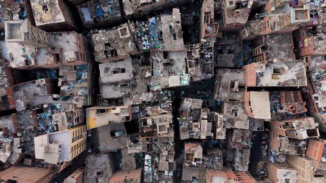 Overhead View Of Manshiyat Naser Settlement With Trash In Cairo, Egypt. - aerial shot