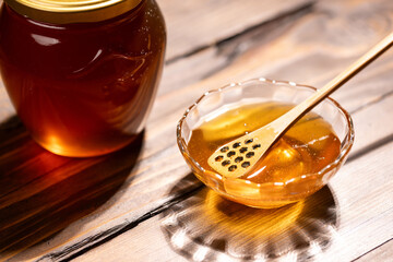 Fresh floral honey in a glass bowl