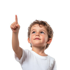 A young boy with curly hair wearing a white shirt pointing upwards against a black background looking up