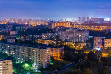 Aerial view of a residential district in kyiv, ukraine, showing illuminated apartment buildings at night