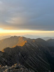 Obraz premium Sunrise view from the summit of Yushan Main Peak or Jade Mountain