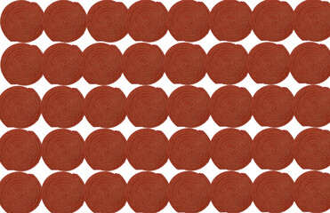 Isolated many brown mosquito coils a s a pattern on white background