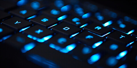 blue glowing computer keyboard technology background