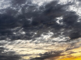 beautiful gradation of orange sky dark black cloudy dramatic, creative natural background