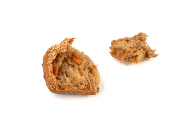 Broken wheat brown bread pieces isolated, fitness pumpkin carrot buns with seeds, cereal bread