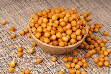 Small pastry balls, fried crispy wheat soup pearls, salad egg puffs or choux pastry