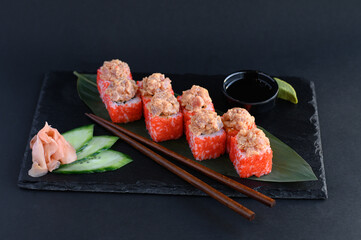 The classic California roll, filled with fresh crab, avocado, and cucumber, wrapped in a layer of seasoned sushi rice and seaweed. A perfect blend of creamy, savory, and refreshing flavors in every bi