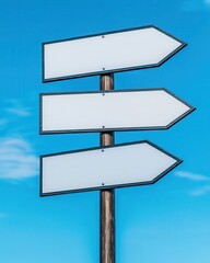 Three Blank Directional Signs Against a Blue Sky Background