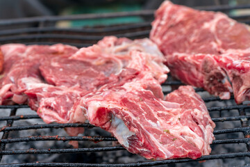 Ribeye beef steak. The ribeye is the juiciest, most marbled steak. It’s cut from the center of the rib section and sold as bone-in or boneless steak. A dish of high gastronomic value. Barbecue.