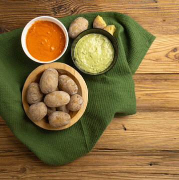 Red mojo rojo and green mojo verde sauces, traditional Tenerife dips, mojo picon dressing