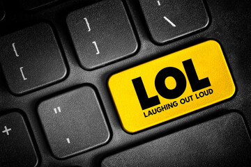 LOL - Laughing Out Loud is an initialism for laughing out loud and a popular element of Internet slang, text concept button on keyboard