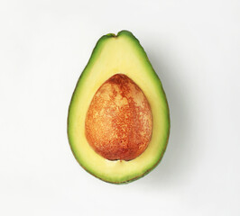 Avocado slice with a stone. On a white background