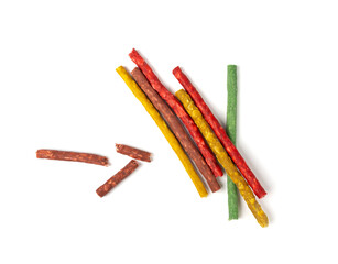 Rawhide chew sticks for dogs, colorful collagen dog food, pressed dry kibble, dental care treats