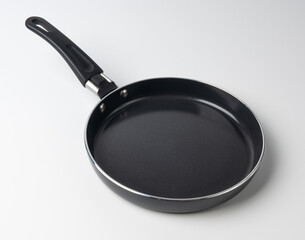 Small frying pan isolated, new non stick mini skillet, empty nonstick surface cookware, single egg pan,