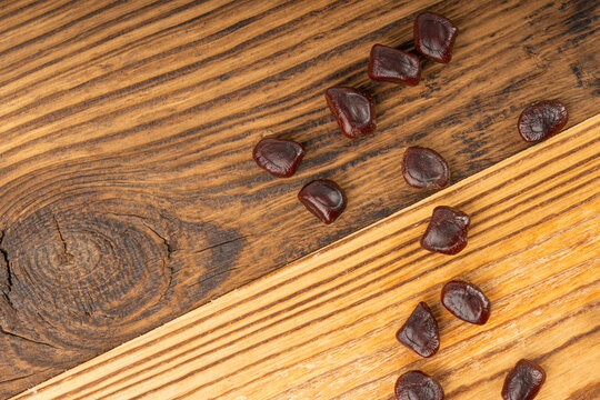 Dried tamarind seeds isolated, Tamarindus indica beans on a white background, medicine ingredient