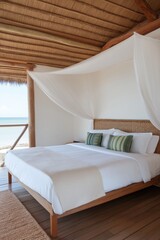 A bed with a white canopy and pillows. The bed is in a room with a wooden floor and a view of the ocean
