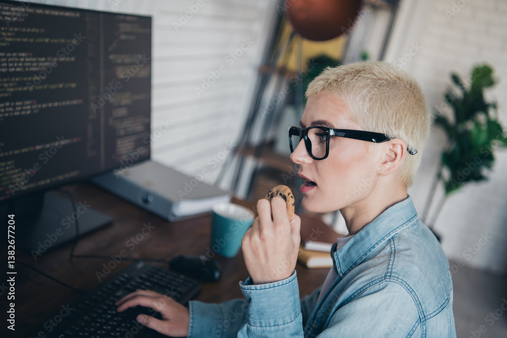 Aufkleber young woman programmer working with code and enjoying a snack in a stylish home office environment