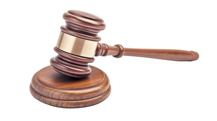 A wooden gavel with a gold band resting on a wooden base against a black isolated background scene