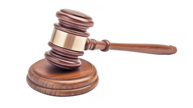 A wooden gavel with a gold band resting on a wooden base against a black isolated background scene