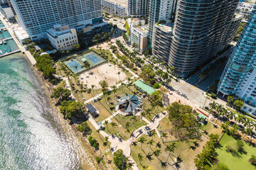 Top-down aerial showing Margaret Pace Park’s playground, volleyball courts, tennis courts, and...