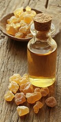 Golden Essential Oil in Glass Bottle With Resin on Rustic Background, Aromatherapy and Skincare