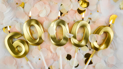 60000 followers card. 60k subscribers and online community fans. Social networks and blogs. Confetti background with candles number 60000 for social media celebration.