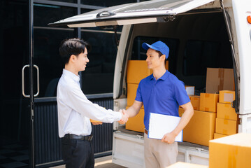 Asian Courier Delivering Package to man Delivery service near van outside the warehouse, delivery home