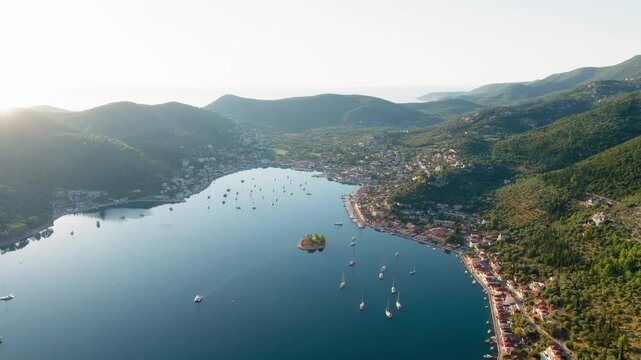 Vathy on Ithaca Island during sunrise surrounded by mountains and Ionian Sea, Drone shot, Panorama