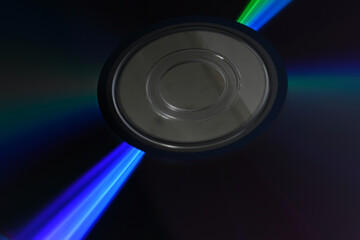 holographic rainbow colored reflection on a CD
