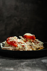 Delicious Pulled Pork Tostadas with Cabbage, Tomato, and Cheese