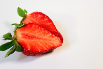 minimalistic photo of ripe and juicy strawberries on a white background