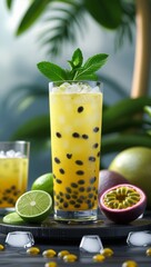 Tropical green cocktail with lime mint and fresh fruits in a glass