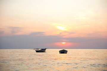 Fishing boats at Lake Tanganyika during sunset in Kigoma, Tanzania on october 24, 2024