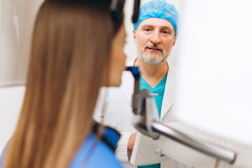 Panoramic dental X Ray for young woman procedure at dentists clinic