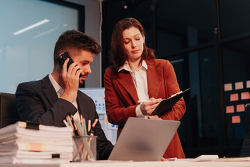 Project manager working overtime and update tasks with milestones progress planning and...