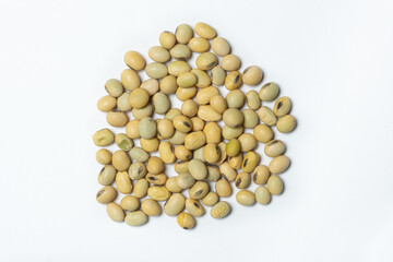Organic raw soybeans close-up vegan superfood on white background top view