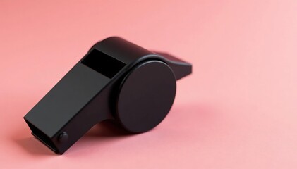 Classic black plastic whistle, simple design, clean background , macro, signal