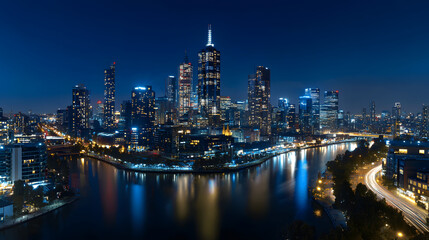 Obraz premium A stunning nighttime view of a vibrant city skyline with tall, illuminated skyscrapers reflecting on a river, surrounded by urban lights.