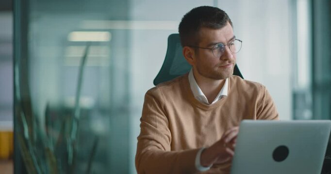 Businessman experiencing headache, fatigue, burnout, and stress in the office while working on a laptop. Symptoms include migraine, depression, anxiety, vertigo, brain fog, and mental health struggles